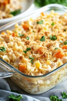 a casserole dish filled with pasta and vegetables