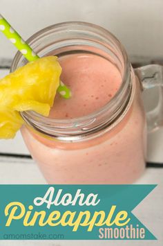 a smoothie in a mason jar with a yellow flower on top