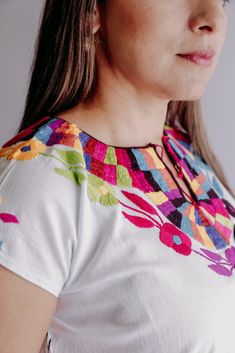 Magia Mexica Mexican Embroidered Blouses Women Blouse multicolored handmade by Mexican artisans. Measurements: ↕ 24 in ↔ 20 1/2 in WARRANTY We use what is needed to make your item arrives 100% safe and intact to your address. SHIPPING & DELIVERY TIMEFRAME We ship your order within 1-2 days after purchase USA: *Free Shipping USA 15-20 business days *Standard: 1 week * Express: 3 days Rest of the World: *Standard 4-6 weeks * Express: 5 days Every order is shipped within 1 business day Includin Folk Style Multicolor Top With Geometric Embroidery, Multicolor Embroidered Tops For Cinco De Mayo Fiesta, Multicolor Embroidered Top For Fiesta, Multicolor Cotton Tops For Cinco De Mayo, Cinco De Mayo Multicolor Cotton Tops, Multicolor Folk Embroidered Top With Embroidered Border, Folk Multicolor Embroidered Tops For Cinco De Mayo, Folk Style Multicolor Embroidered Top For Cinco De Mayo, Multicolor Folk Tops With Woven Motifs