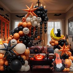 halloween decorations are arranged in the living room