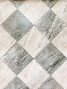 a white and grey checkered tile floor