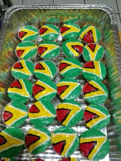 some cupcakes that have been decorated to look like the flag of south africa