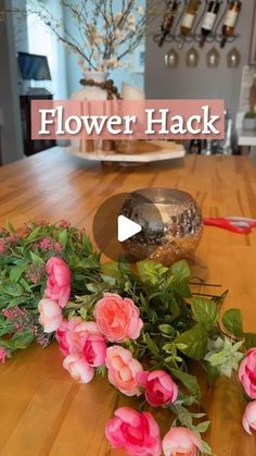 flowers on a table with the words flower hack in front of it and an image of pink