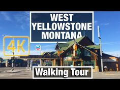 a sign that says west yellowstone montana walking tour in front of a building with the words 4k on it