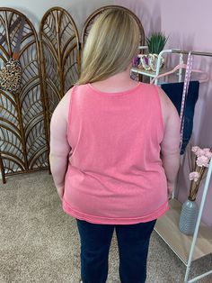 This tank is so light and soft! We love the cotton and polyester material - perfect airy for the summer. This tank has functional top buttons and goes great with denim or leggings. Sizing: Stephanie is 5'6 and wearing the 2X. Her measurements are 50"/43"/54" for bust/waist/hips. Measurements (bust/hips/front length/back length): 1X: 54"/60"/28" 2X: 56"/62"/29" 3X: 58"/64"/30" Coral, Leggings, How To Wear