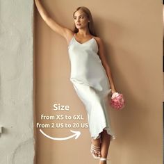 This stunning white silk satin slip dress is the perfect choice for a beach wedding or civil ceremony. The elegant midi length and sleek silhouette of this silk slip dress will make any bride feel radiant on her special day. With its delicate fabric and timeless design, this dress is sure to be a beautiful and memorable choice for your wedding. Make a statement with this modern yet classic piece that embodies sophistication and beauty. ♥ Material:  silk ♥ Color:  Ivory ♥ Sizes: XS, S, M, L, XL, Elegant Sleek Slip Dress For Weddings, Slip Wedding Dress Midi, Slip Dress Silk, Civil Wedding Dress, Wedding Dress For Bride, Dress For Bride, Wedding Dress White, Slip Midi Dress, Civil Wedding Dresses