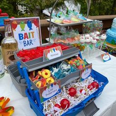 an assortment of desserts are displayed on a table