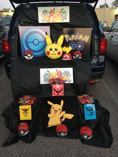 the back end of a car with pokemon themed items