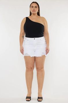 Cleo High Rise Shorts (Plus Size) by Kancan | The Ultimate Denim Shop | Premium denim meets comfort | Designed in Los Angeles. Our Cleo High Rise Shorts is perfect for Summer. Get comfortable in our stretch white color denim that accentuates your curves and is great for everyday wear. Features a fun frayed hem, a single button, optic white color, and distress! Shop now! trendy plus size shorts, high waisted plus size shorts, stylish plus size shorts, plus size casual wear, summer fashion Casual White Bottoms With Frayed Hem, Stretch Mid-rise White Jean Shorts, White Stretch Mid-rise Jean Shorts, White Bottoms With Frayed Hem For Summer, White Mid-rise Bottoms With Frayed Hem, White Stretch Mid-rise Shorts, High Waist White Bottoms With Frayed Hem, White High-waist Bottoms With Frayed Hem, Trendy White Shorts With Frayed Hem