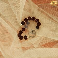 Embrace the power of Om with this divine Rudraksha bracelet crafted in 925 silver. Visit Link in bio 🔗 Dm @karvi_jewels or contact 8058274211 for the further details. #silver #bracelets #bracelet #handmade #handmadejewelry #indianjewelry #jewellery #jewelry #rudraksh #shivjewlery #shivajewelry Gold Earrings Designs, Bracelet For Men, Bracelet Crafts, Bracelet Handmade, Designer Earrings, Indian Jewelry, Silver Bracelets, Diy Fashion