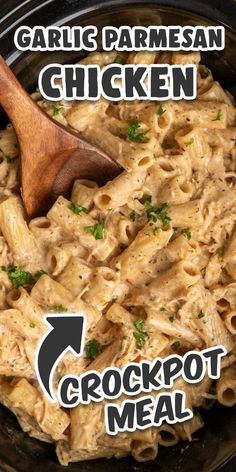 a close up of a bowl of food with a wooden spoon in it and the words garlic parmesan chicken crockpot meal