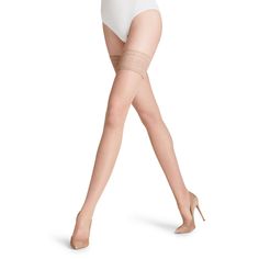 These elegant, sheer FALKE stay-ups with an improved, even knit structure ensure a silky feel on the skin. The non-slip silicone coating and the lightly reinforced, non-laddering toe and soft seam ensure the highest level of comfort. For optimum hold, please refrain from applying lotion to your legs. Fitted Cream Thigh-high Stockings, Elegant Fitted Summer Stockings, Elegant Sheer Stockings For Party, Cream Thigh-high Hosiery, Feminine Thigh High Stretch Stockings, Feminine Thigh High Stretch Legwear, Feminine Thigh High Stretch Hosiery, Feminine Thigh-high Stretch Stockings, Feminine Fitted Thigh High Hosiery