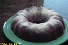 a bundt cake sitting on top of a green plate