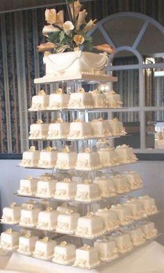 a wedding cake that is stacked on top of each other