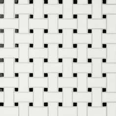 a white and black tile wall with squares in the middle, on top of each other