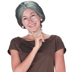 Let your inner grandma out to play with this grey wig. Top your granny Halloween costume with this character wig to make your transformation complete. Old style grey wig with traditional bun in the back. One size fits most.Special Shipping Information: This item ships separately from other items in your order. Imported. Granny Halloween Costume, Grandma Halloween Costume, Granny Wig, Granny Costume, Old Lady Costume, Old Granny, Bride Of Chucky, Grey Wig, Old Lady