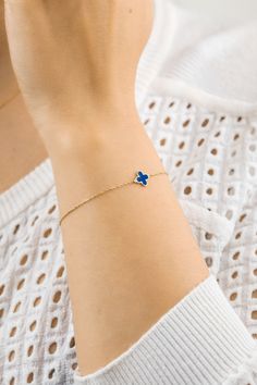 Add style to a basic look with this blue enamel clover charm bracelet.  Minimalistic good luck charm bracelet lay flat on the wrist for an elegant rich shine Strong, durable, and comfortable, this 18k gold bracelet is perfect for all ages and for any occasion.  Wear alone with a casual or formal outfit for everyday modern elegance or as a great layering bracelet for an on-trend statement. What makes our product unique? Our jewelry not only emphasizes the beauty of every woman but expresses their Four Leaf Clover Charm, Lucky Leaf, 18k Gold Bracelet, Good Luck Gifts, Gold Armband, Clover Charm, Luck Charm, Gold Charm Bracelet, Best Gifts For Her