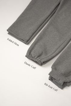 Solid Cotton Tracksuit With Pockets, Winter Cotton Tracksuit With Side Pockets, Winter Tracksuit With Elastic Waistband And Relaxed Fit, Winter Fleece Pants With Elastic Cuffs, Winter Cotton Joggers With Ribbed Cuffs, Fleece Pants With Elastic Cuffs For Winter, Cozy Cotton Tracksuit For Fall, Comfortable Cotton Winter Tracksuit, Plain Cotton Sweatpants For Loungewear