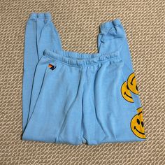 So Cute And Chic! An Iconic Smiley Sweatpants. Light Blue Smiles Down One Leg Slightly Pilled. Pics Above. Doesn’t Affect The Pants Excellent Used Condition No Lowballs No Trades Thank You Aviator Nation White Sweatpants, Sweatpants Aviator Nation, Purple Aviator Nation, Aviator Nation Pink Stripe Sweatpants, Blue Aviator Nation Sweatpants, Aviators Women, Smiley, Light Blue, Sweatpants