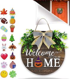 welcome to our home door hanger with pumpkins, leaves and other holiday decorations