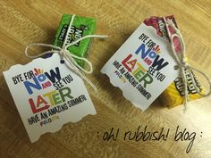 two colorful candy bags tied up to each other on top of a wooden table with the words now and later printed on them