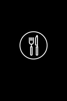 a black and white photo with a fork and knife in the shape of a circle