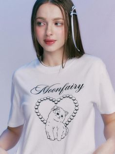 This is a casual and trendy top by MOONFAIRY that is made out of high quality and sturdy material. With distinctive mood of the design and comfortable wear, you can style it for your casual daily outfit.- Unique graphic artwork detail- Soft and sturdy cotton 100% fabric- Young and feminine mood Trendy Streetwear T-shirt With Cat Design, Trendy Cat Design T-shirt For Streetwear, Spring White T-shirt With Cat Design, White Graphic Tee With Cat Print, White Cat Design Tops For Streetwear, White Cat Design Top For Streetwear, Trendy White T-shirt With Cat Print, White Relaxed Fit Top With Cat Design, White T-shirt With Cat Design For Streetwear