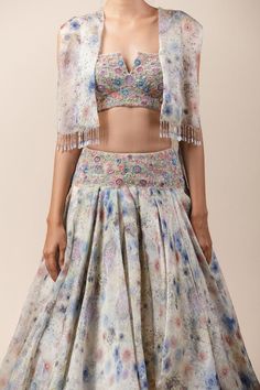 Multi-color printed layered lehenga paired with resham-badla worked cropped bustier-blouse. Comes with crystal tassel cape.
Component: 3
Embroidered, Printed
Fabric: Sheer Silk, Tulle
Color: Multi Color
Crystal tassels
Layered lehenga
Front open cape - Aza Fashions Multicolor Digital Print Georgette Lehenga, Traditional Georgette Lehenga With Digital Print, Multicolor Silk Sharara With Digital Print, Multicolor Silk Lehenga With Digital Print, Designer Digital Print Lehenga For Festive Occasions, Festival Reception Dupatta With Digital Print, Anarkali Lehenga With Digital Print For Reception, Designer Multicolor Digital Print Choli, Bollywood Style Sharara With Digital Print For Reception