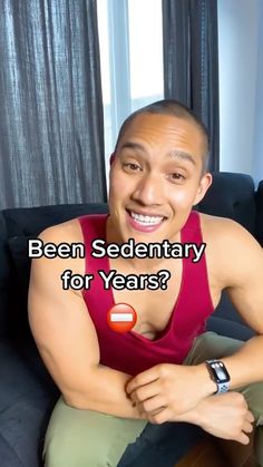 a man sitting on top of a couch next to a window with the caption been sedentary for years?