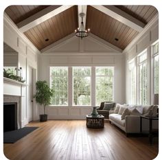 a living room filled with furniture and a fire place in front of a large window