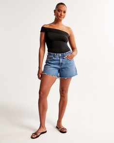 Embrace the casual flair of the Abercrombie & Fitch Women's Curve Love Low Rise Baggy Shorts, designed to flatter and provide comfort. These shorts are a perfect blend of style and practicality, featuring a low rise and a baggy, relaxed fit through the leg, while remaining fitted at the waist. The unique Curve Love design includes an extra 2 inches through the hip and thigh, effectively eliminating waist-gap for a smoother silhouette.

- Size: 36
- Color: Medium Indigo Wash
- Material: Pocket Ba Relaxed Fit Cutoff Bottoms For Day Out, Relaxed Fit Straight Leg Shorts For Day Out, Chic Relaxed Fit Straight Leg Shorts, Baggy Shorts Women, Baggy Shorts, Love Design, A 4, Abercrombie Fitch, Medium Size