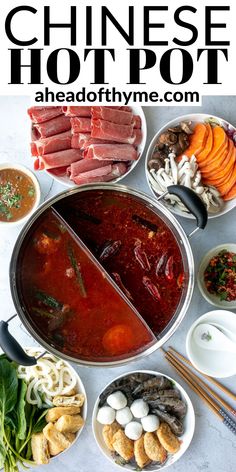 the chinese hot pot is full of meat, vegetables and other ingredients to make it