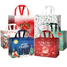 four christmas shopping bags with different designs on them