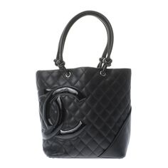 Chanel Matelasse Gst Black Silver Hardware Caviar Skin Tote Bag Size: H: Approx. 24.5cm W: Approx. 19cm (Bottom) D: Approx. 11cm Handle: Approx. 42cm Color: Black/Silver Metal Fittings High-end Black Shoulder Bag With Silver-tone Hardware, Luxury Satchel With Silver-tone Hardware In Tote Shape, Designer Black Shoulder Bag With Silver-tone Hardware, Luxury Black Shoulder Bag With Silver-tone Logo, Black And Silver Chanel Bag, Tote Bag Size, Chanel Bags, Silver Hardware, Chanel Bag