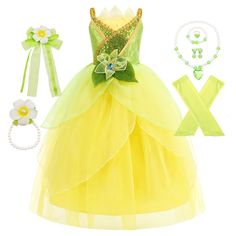 PRICES MAY VARY. Elegant Princess Dress: This stunning dress features a vibrant yellow ombre design with ruffled layers for a fairytale-inspired look. Glamorous Accents: Adorned with a shimmering green sequined bodice and a beautiful floral applique, adding a touch of enchantment. Coordinating Accessories: Includes a pearl bracelet/hair band, floral hair bow, oversleeves, and necklace set. Versatile Size: Available in multiple sizes to accommodate various age groups. Imaginative Play: Encourages creativity and imaginative role-play for endless hours of dress-up fun. Application: Halloween, Christmas, Wedding, Party, Birthday Gift, Carnival Enchant your little princess with this stunning yellow ball gown dress set. The dress features a shimmering bodice adorned with sequins and a sweetheart Tiana Frog, Yellow Ball Gown, Elegant Princess Dress, Kids Halloween Birthday Party, Outfits With Accessories, Pretend Play Costumes, Christmas Wedding Party, Frog Princess, Princess Dress Kids