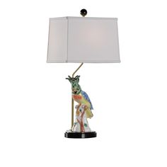 a lamp that has a bird on it