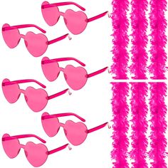 pink heart shaped sunglasses are lined up against a white background