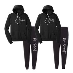 "Hubby & Wifey - Personalized Mr. & Mrs. Sweatsuits - Matching gifts for the couple - EACH SET SOLD SEPARATELY HOODIES: This unisex pullover hoodie is remarkably soft with a loose fit that is versatile and lends itself to daily wear. Spun from a plush fabric that is made up of cotton and polyester fibers, this hoodie features an up-to-date fit, hood with white drawcords, kangaroo pocket, ribbed cuffs and waistband. Features: Side-seamed. Retail fit. Unisex sizing. White cord drawstring. Kangaroo Wedding Sweatsuit, Wedding Crocs, Cute Loungewear Sets, Matching Sweatsuit, Matching Sweats, Cute Couple Gifts, Waistband Pants, Bridal Jumpsuit, Bride And Groom Gifts