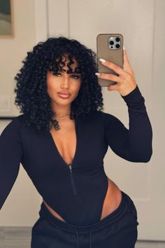 This hairstyle has lots of bouncy curls that fall down from the side of the head, easily framing the face with varied texture and dimension. The layers are expertly cut to improve the hair's natural curls, giving both form and motion that highlight the wearer's appearance. These face-framing layers are not only fashionable - Click to see more of Curly Hair Crush: 30 Enchanting Face-Framing Layers to Rock in 2024 and follow us for more hairstyle ideas. // Photo Credit: Instagram @yarisantiago Hair Bangs And Layers, Waterfall Braid Hairstyle, Curly Hair Bangs, Deva Cut