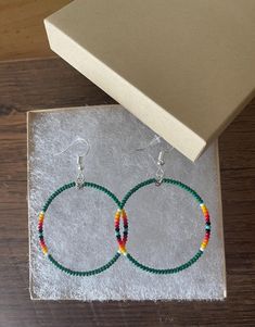 Native American style beaded hoop earrings  size:1.5"  color: hunter green  gift box included for gift giving    Sterling silver wires first quality glass czech seed beads size 11/0.    I guarantee all of my beaded earrings or your money Handmade Beaded Bracelets For Gifts, Green Small Hoop Beaded Earrings With Tiny Beads, Green Hoop Earrings With Tiny Beads, Green Hoop Beaded Earrings With Dangling Beads, Handmade Green Beaded Hoop Earrings, Green Tiny Beads Small Hoop Jewelry, Green Dangle Hoop Earrings With Tiny Beads, Green Small Hoop Jewelry With Tiny Beads, Green Small Hoop Earrings With Tiny Beads