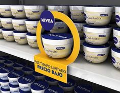 several jars of mayonnaise are on display in a grocery store, with the sign saying nivea next to them