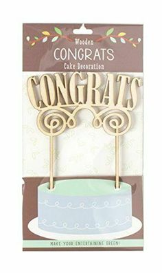 a wooden cake topper with the words congrats on it