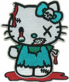 a hello kitty iron - on patch with a skull and crossbones in the background