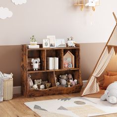 a child's room with a teepee tent, bookshelf and stuffed animals