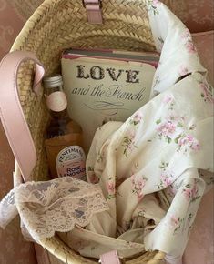 a basket filled with lots of items sitting on top of a table