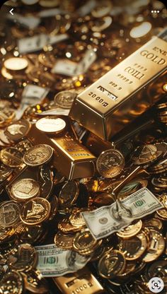 a pile of gold bars and money on top of each other