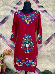 Multicolor Long Sleeve Embroidered Dress For Festive Occasions, Festive Tunic Dress With Multicolor Embroidery, Long Sleeve Dress With Embroidered Border For Festivals, Multicolor Long Dress With Resham Embroidery, Multicolor Long Sleeve Folk Dress, Multicolor Folk Long Sleeve Dress, Traditional Dress With Embroidered Neckline For Festivals, Traditional Tunic Dress With Multicolor Embroidery, Traditional Red Tunic Dress