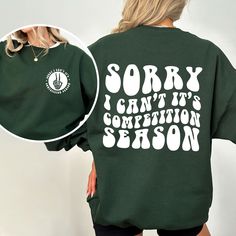 Sorry Can't Comp Season Comp Season Sweatshirt, Cheer Competition Sweatshirt, Retro Dance Competition, Dance Mom Sweat, Favorite Season ---------- Ordering Your Custom Design T-shirt: Step by Step ---------- 1. Select your preferred t-shirt color. 2. Specify your desired size. 3. Pick the color for both your design and text. 4. Ensure that each step of your order is accurately completed. M A T E R I A L S → Our solid color options such as White and Black consist of 100% Cotton. → The Heathered Colors are a blend of cotton and polyester, ensuring a luxuriously soft feel. → Crafted as Short Sleeve Crew-Neck Unisex T-Shirts. → Composed of soft, high-quality Sueded Jersey fabric. → Pre-shrunk for lasting fit. → Taped shoulder-to-shoulder for enhanced durability. → Tear away label for added com Green Band Merch Top For Fall, Retro Dance, Cheer Competition, Competition Dance, Competitive Cheer, Dance Mom, Dance Competition, Favorite Season, Design T Shirt