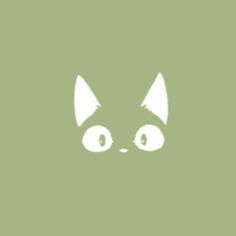 an image of a cat's face with big eyes on a green background,