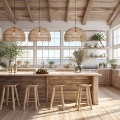 a kitchen with wooden floors and white walls, along with large windows that look out onto the ocean